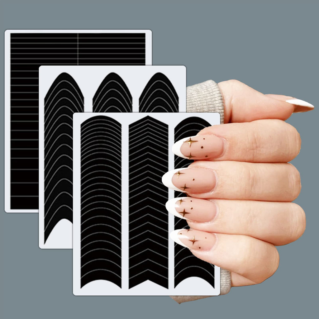 Close up of V-shaped and moon-shaped manicure stickers