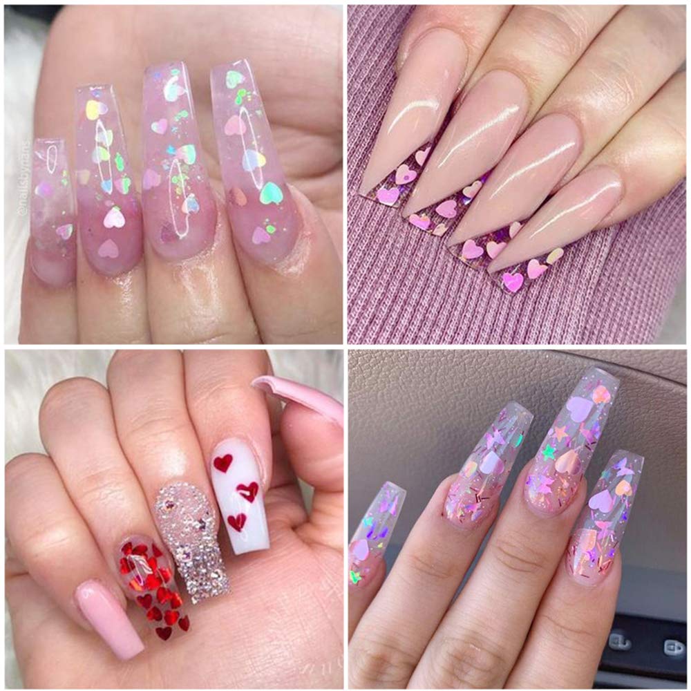 Close up of laser holographic heart nail flakes on acrylic nail