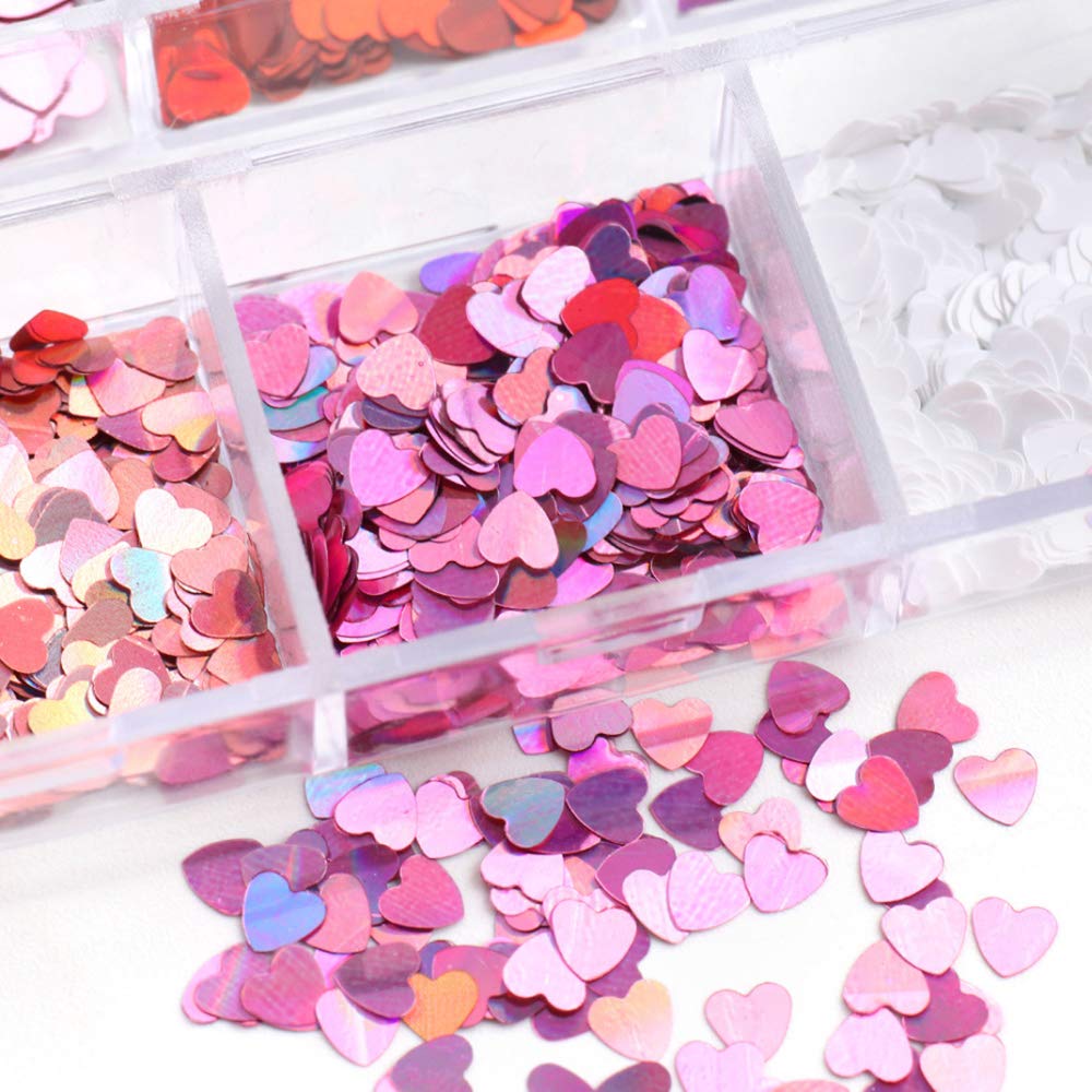 Top view of mixed size heart glitter decals for manicure