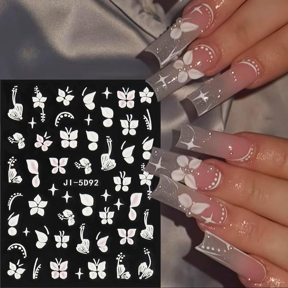 Spring themed nail art with butterfly and rose stickers