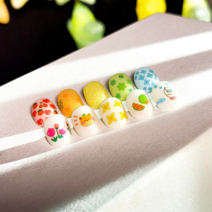 Variety of cute animal and floral nail decal designs on sheets