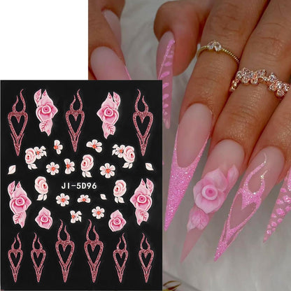 Application of white floral nail decals on manicured nails