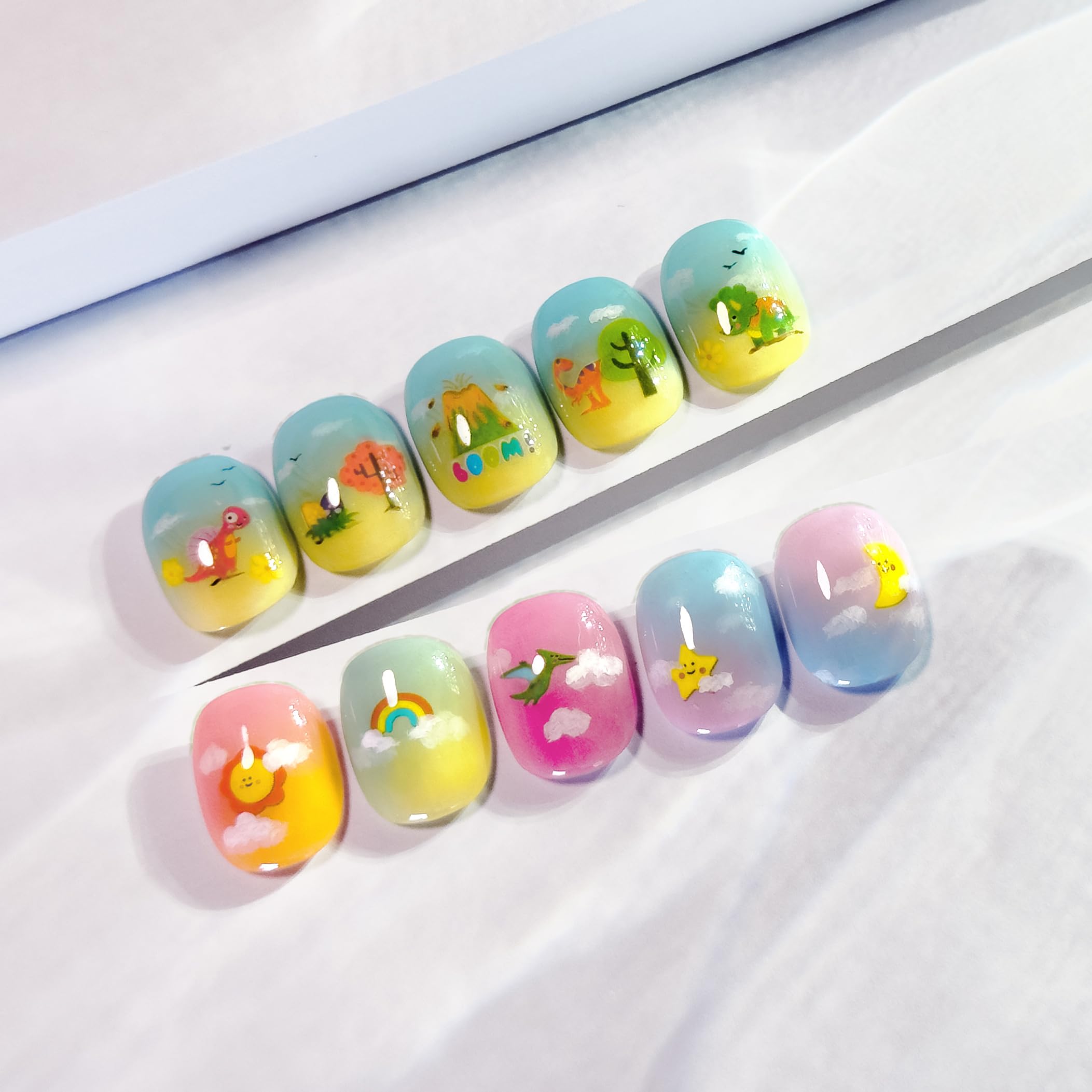 Girl applying self adhesive nail decals at home