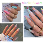 Close up of colorful spring daisy nail decals on sheet
