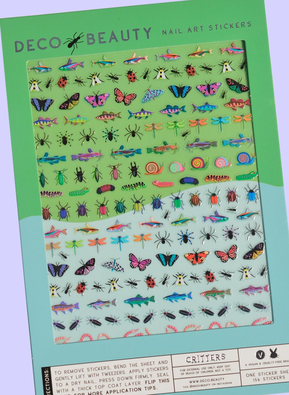 Close up view of Deco Beauty Critters nail art stickers applied on manicured nails.