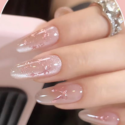 Applying Accio nail art decals with tweezers