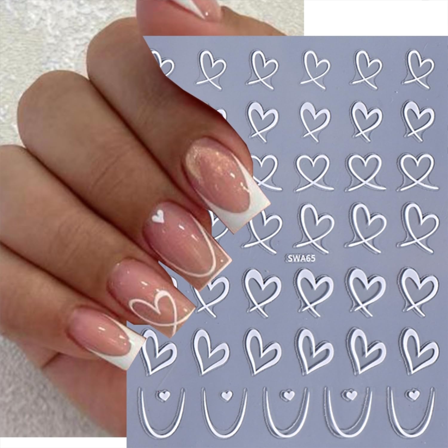 Close up of 3D black and white heart nail art decals