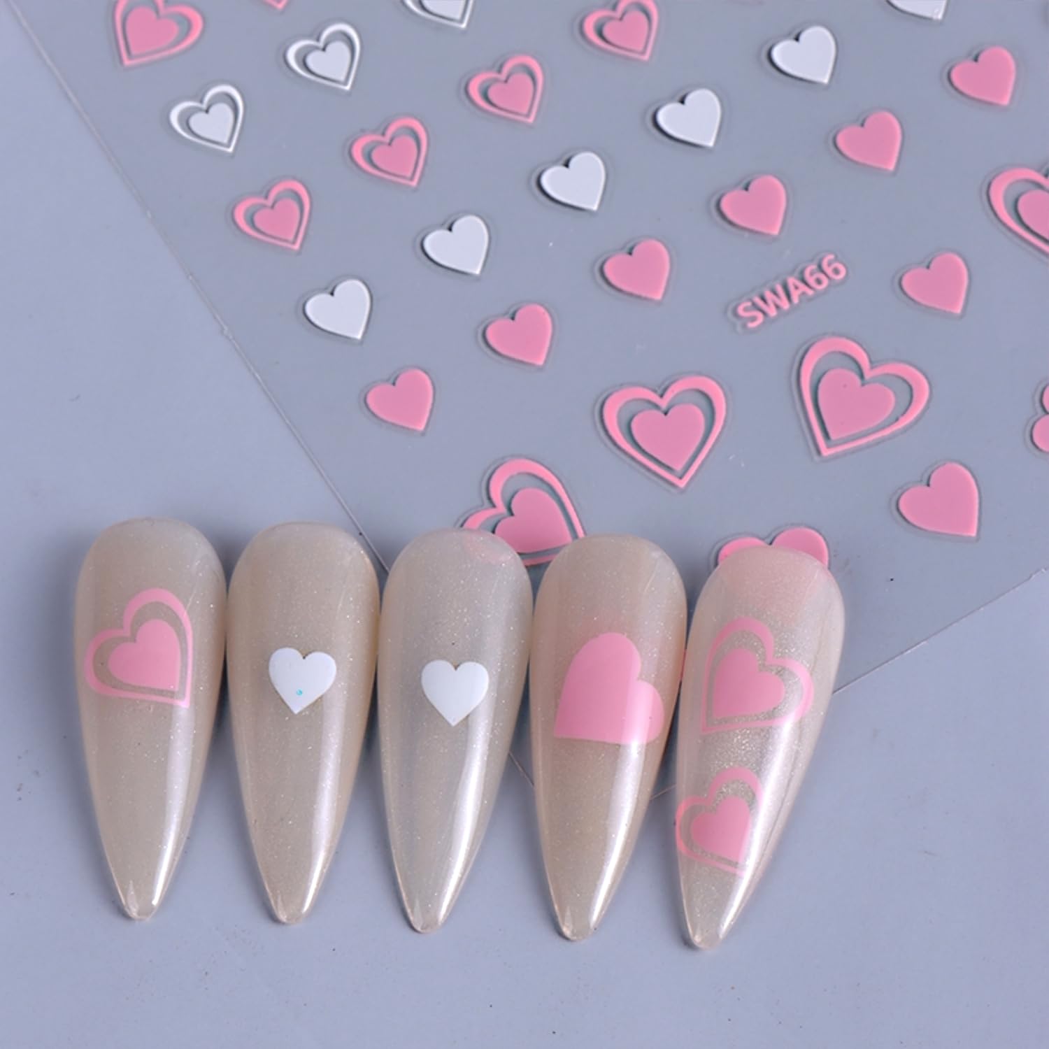 Collection of self adhesive heart nail decals for manicure