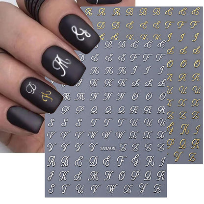 Manicure showcasing vintage style letter nail art design