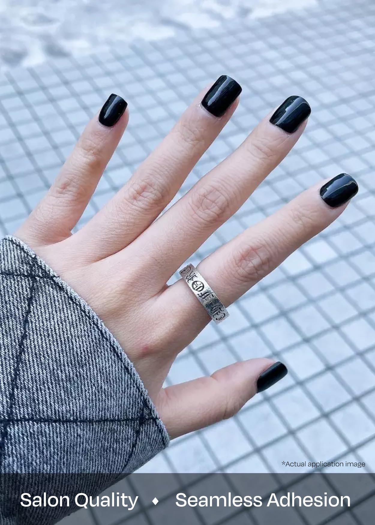 Model showing dark solid N Onyx manicure style