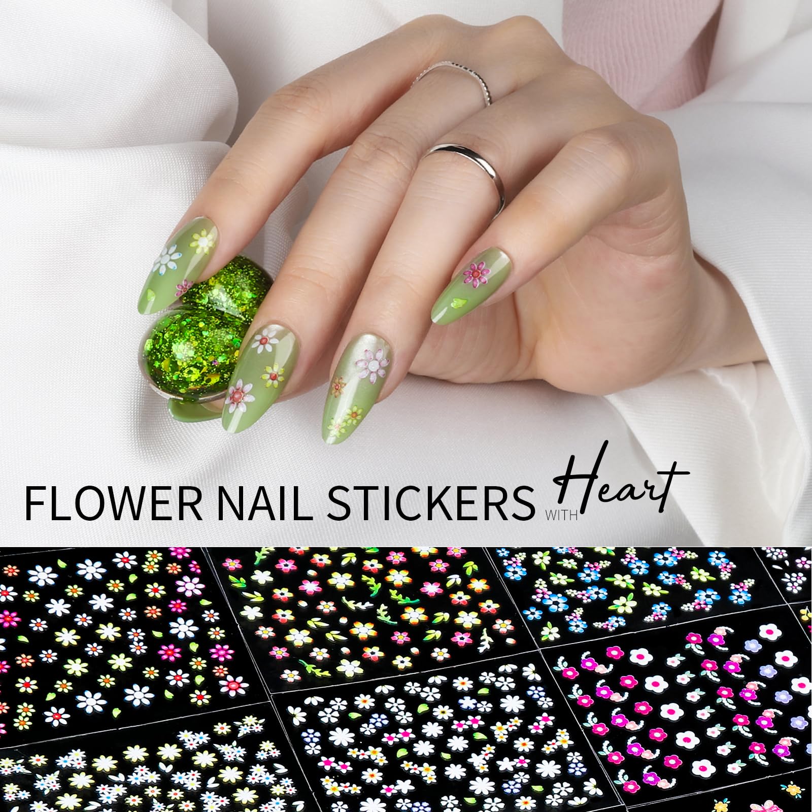 Close up view of gold floral nail decals and colorful star stickers on acrylic backing sheets