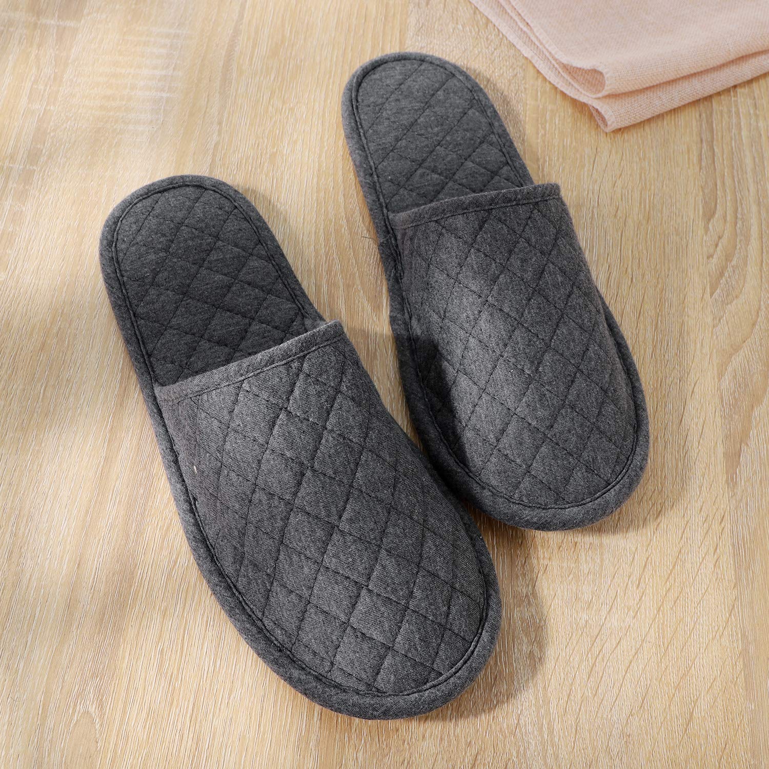 Ibluelover foldable house shoes neatly packed inside the matching grey storage bag.