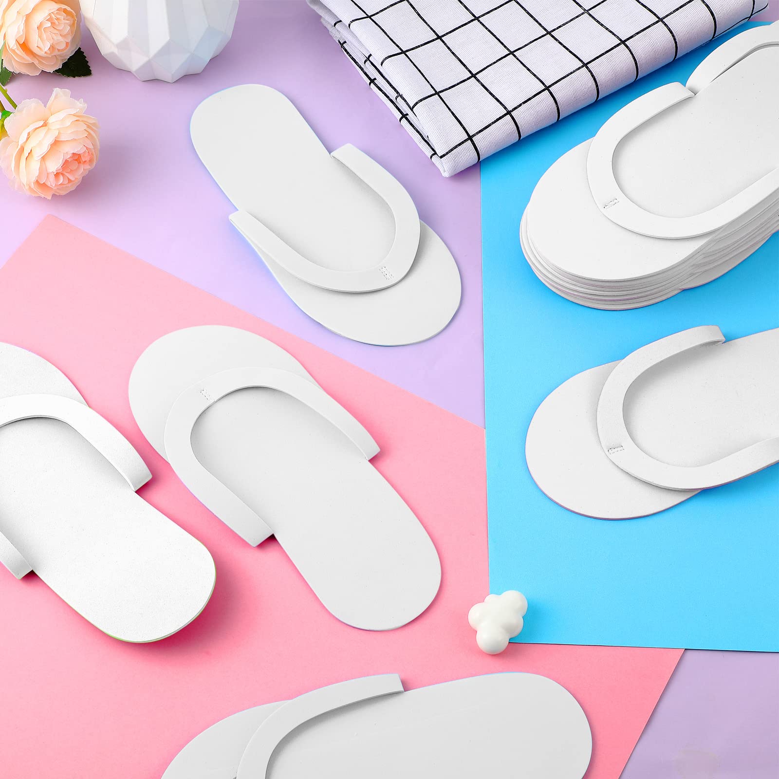 Close up of skid-proof texture on white disposable slippers