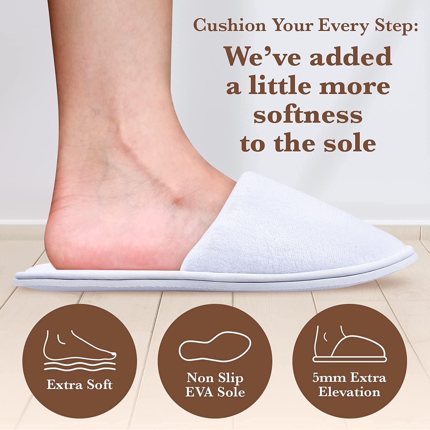Side profile of the MAJI SIMPLY JOYOUS white spa slipper highlighting the cushioned memory foam footbed