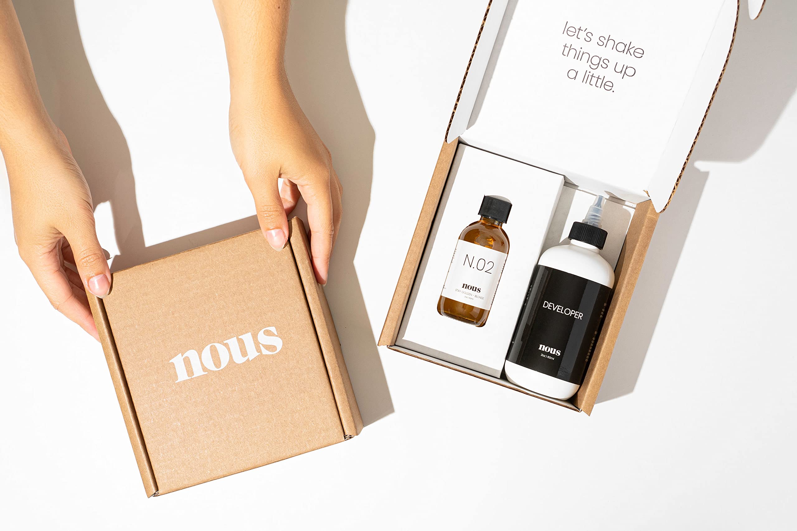 Nous Hair Gloss Treatment 2 fluid ounce bottle for color refreshing