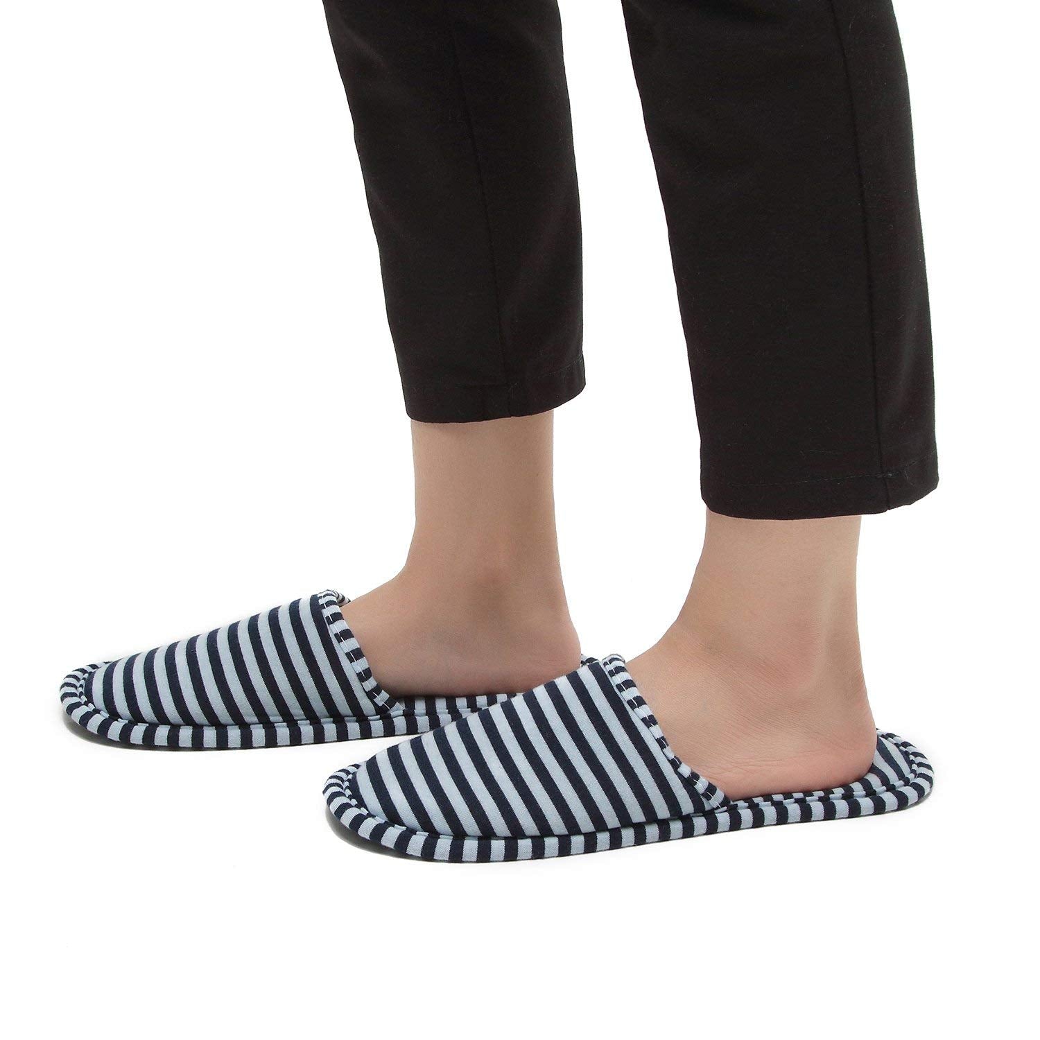 Side profile of IPENNY hotel spa slippers highlighting the thick padded sole