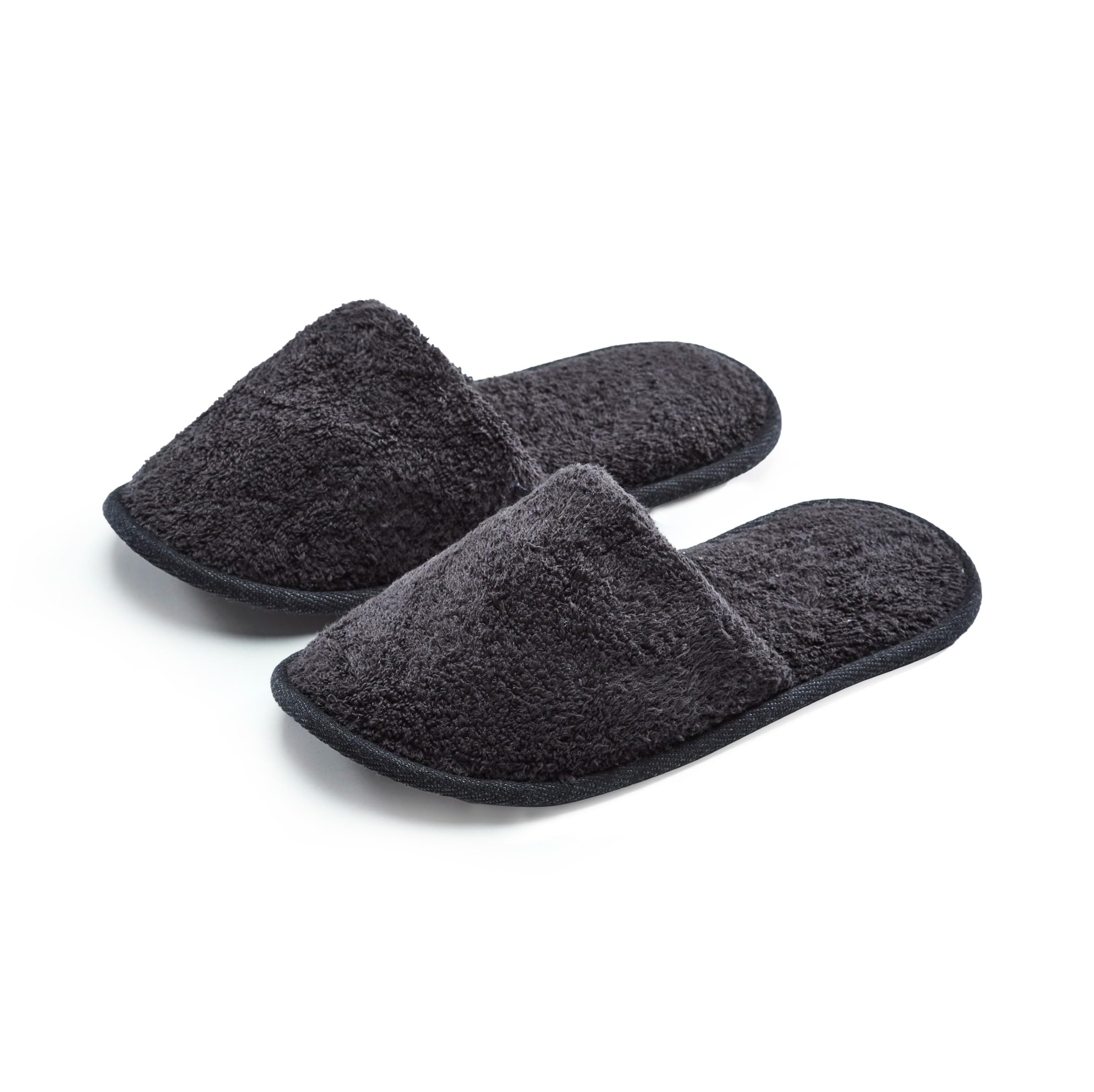 Eskymode travel hotel slippers displayed in neutral home setting