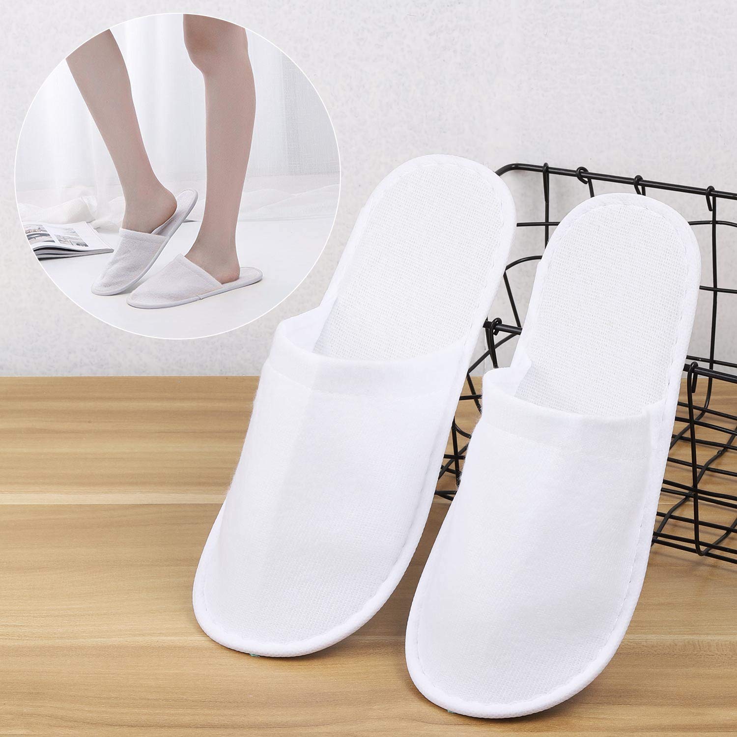Bulk arrangement of the authentic imported white disposable slippers showing the complete package quantity.
