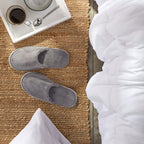 Juvale fleece spa slippers bulk pack showing soft fabric texture