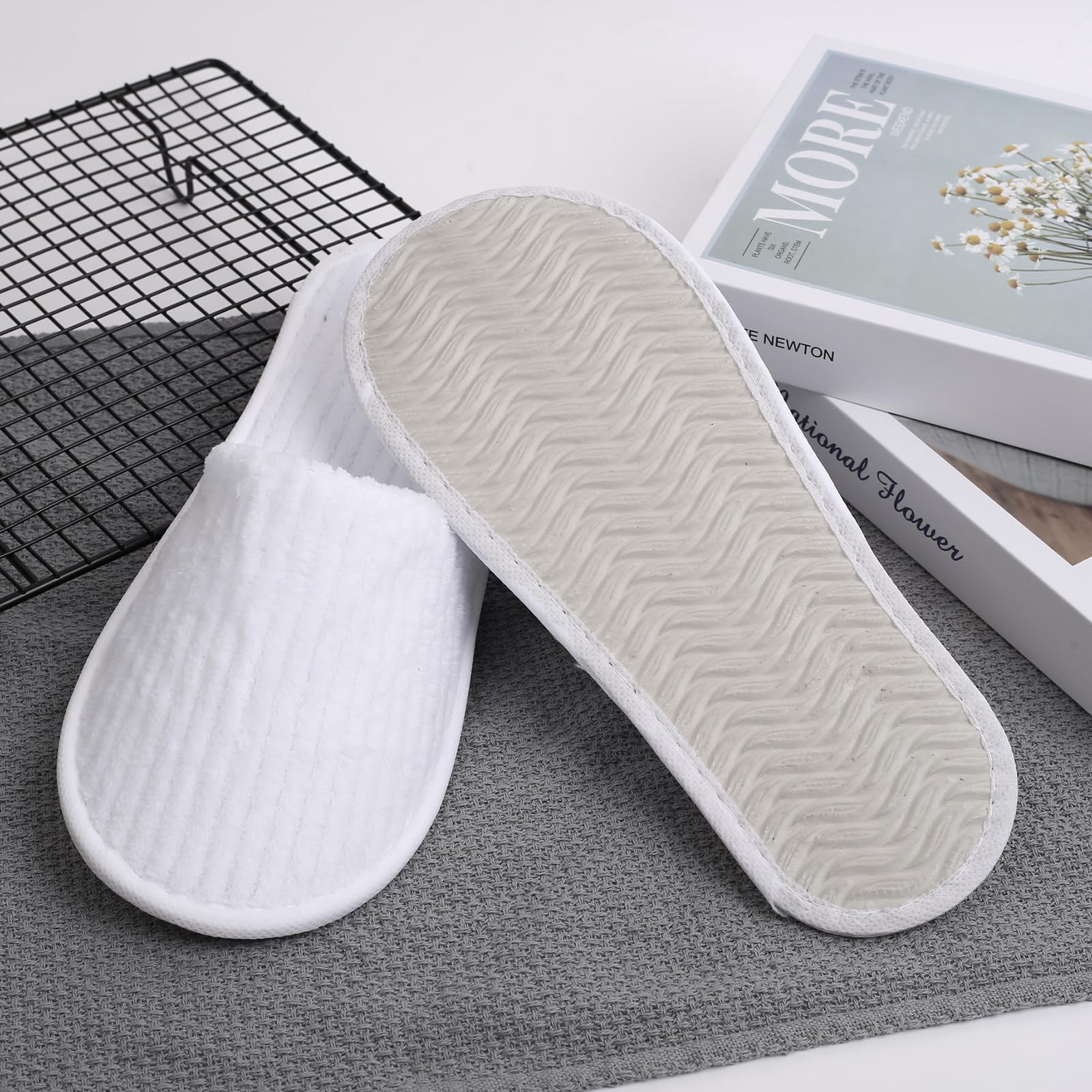 Frcctre disposable slippers displayed for hotel and travel use