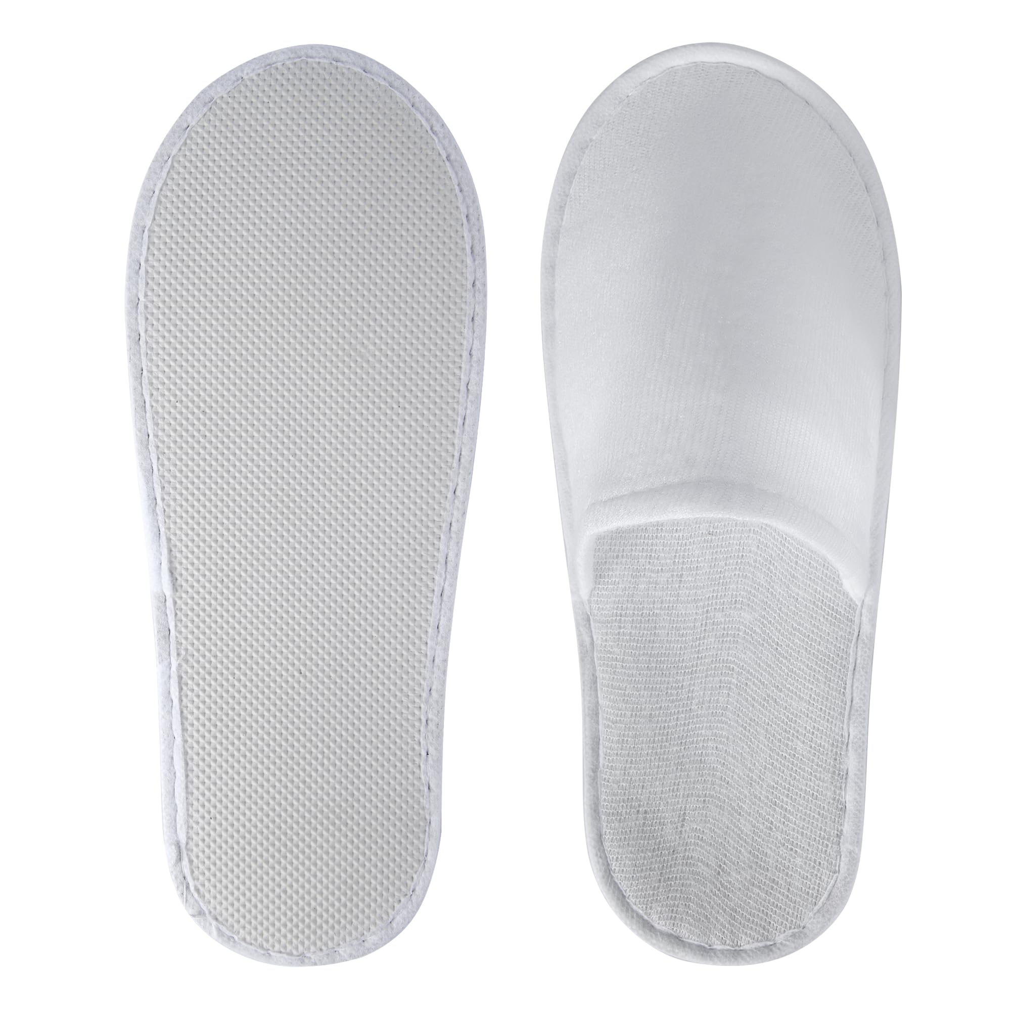 Top down view of UrbanRoots white hotel and guest slippers