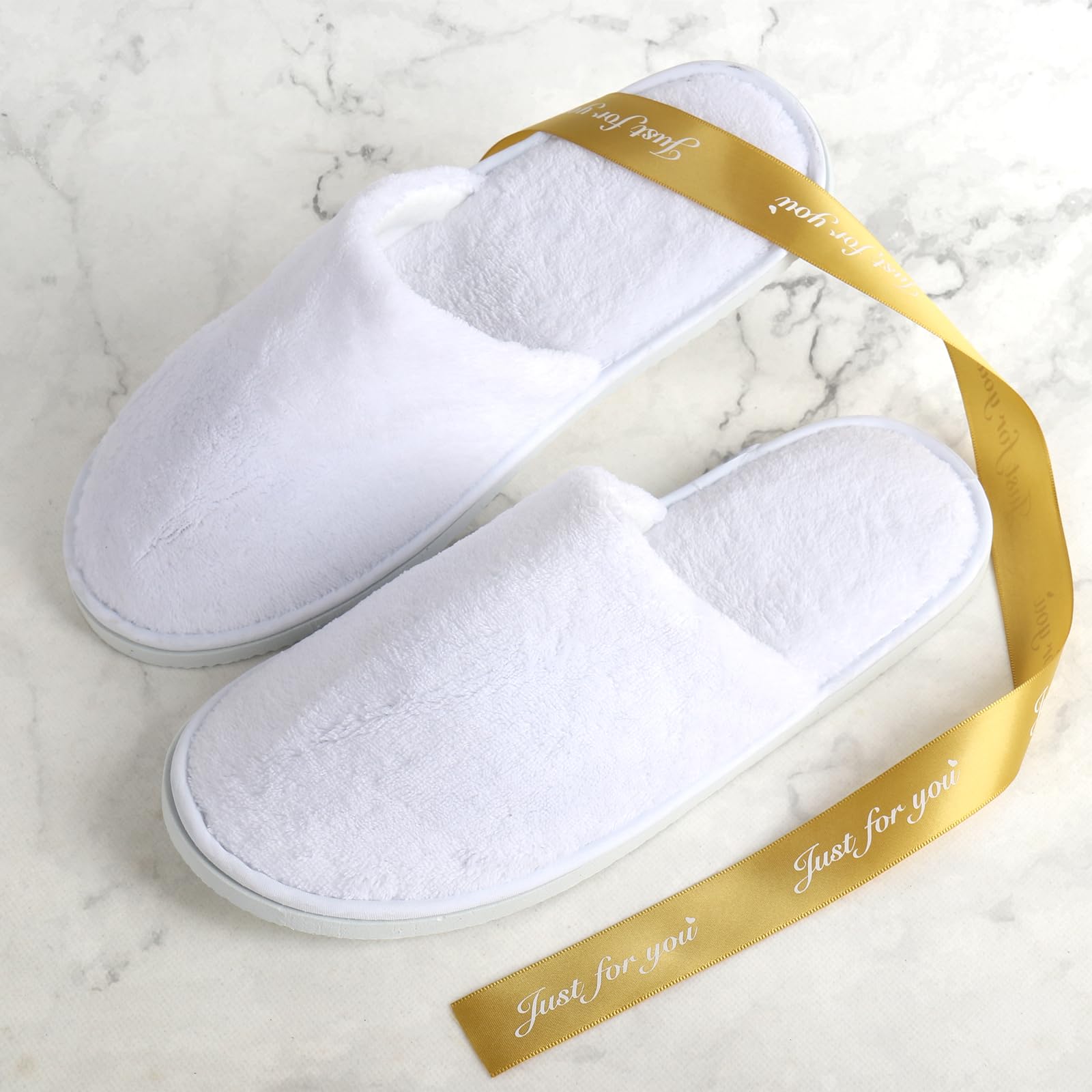 White cotton disposable hotel slippers with non-slip sole
