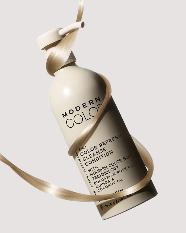 Application of Modern Color 3-in-1 hair treatment with a brush