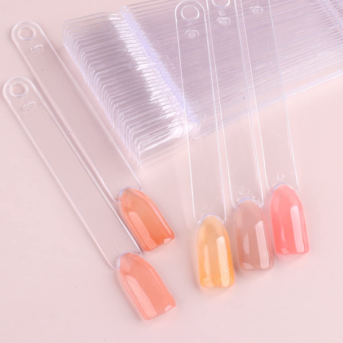 Top view of 150 pieces clear acrylic nail practice tips in sets