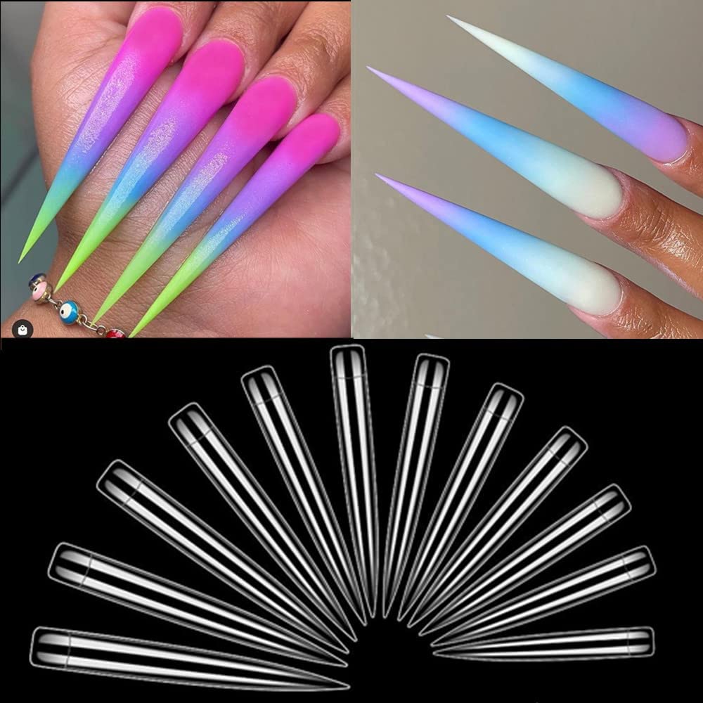 Clear stiletto nail tips arranged for manicure application