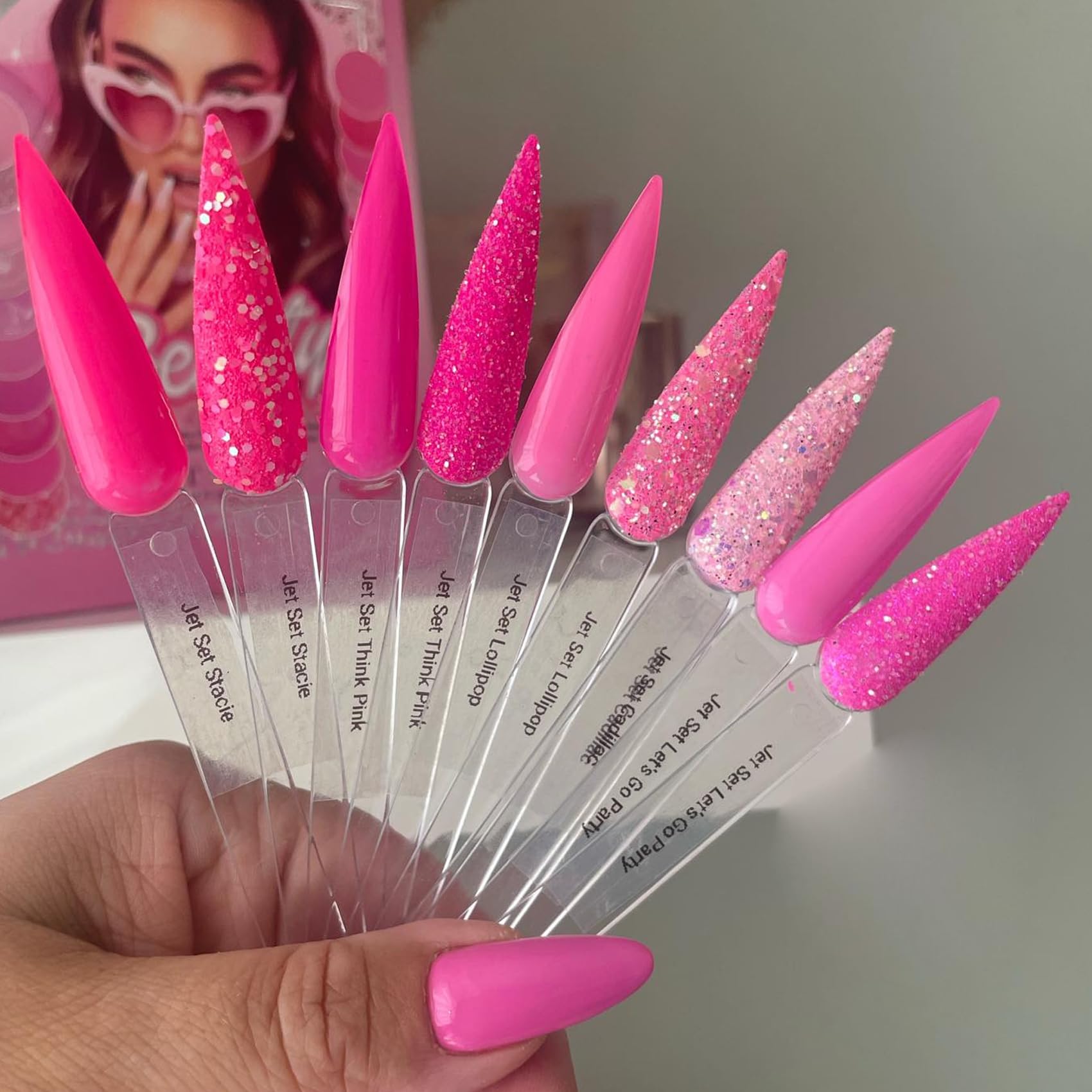 Close up of stiletto practice nail tips for color swatching