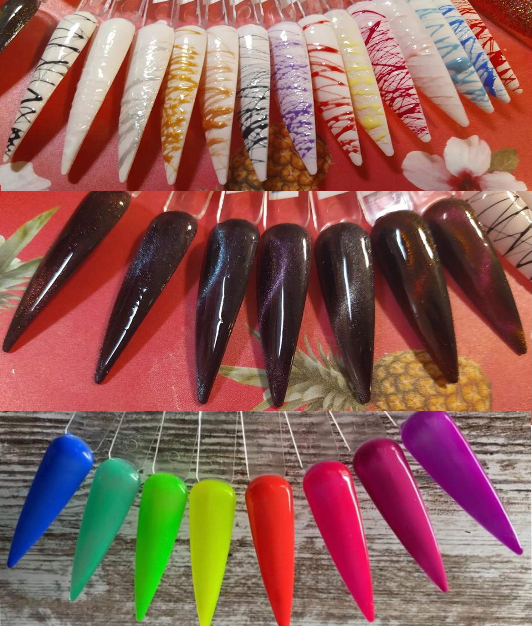 Hand holding nail art swatch sticks showing color application