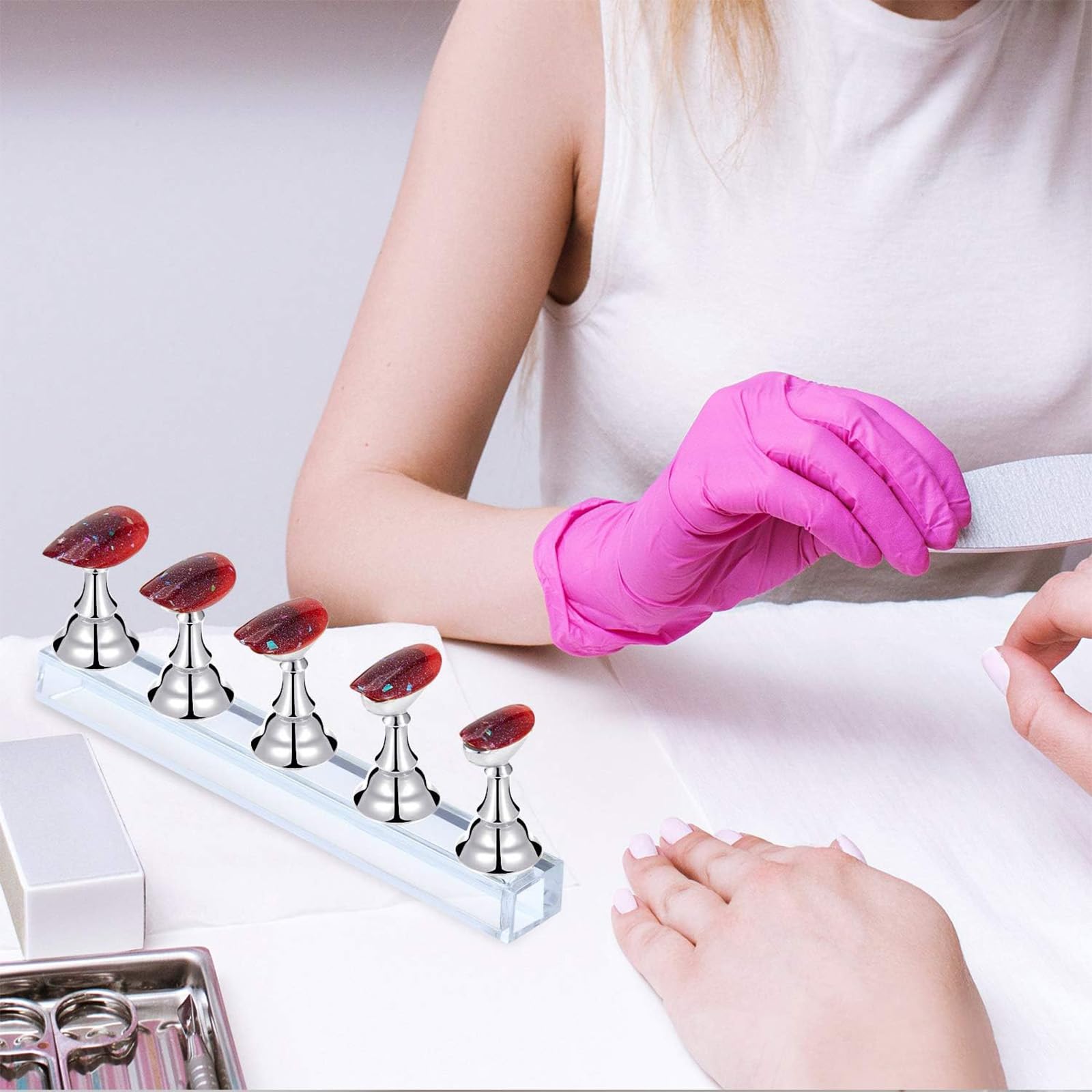 Close up of magnetic base for false nail tips
