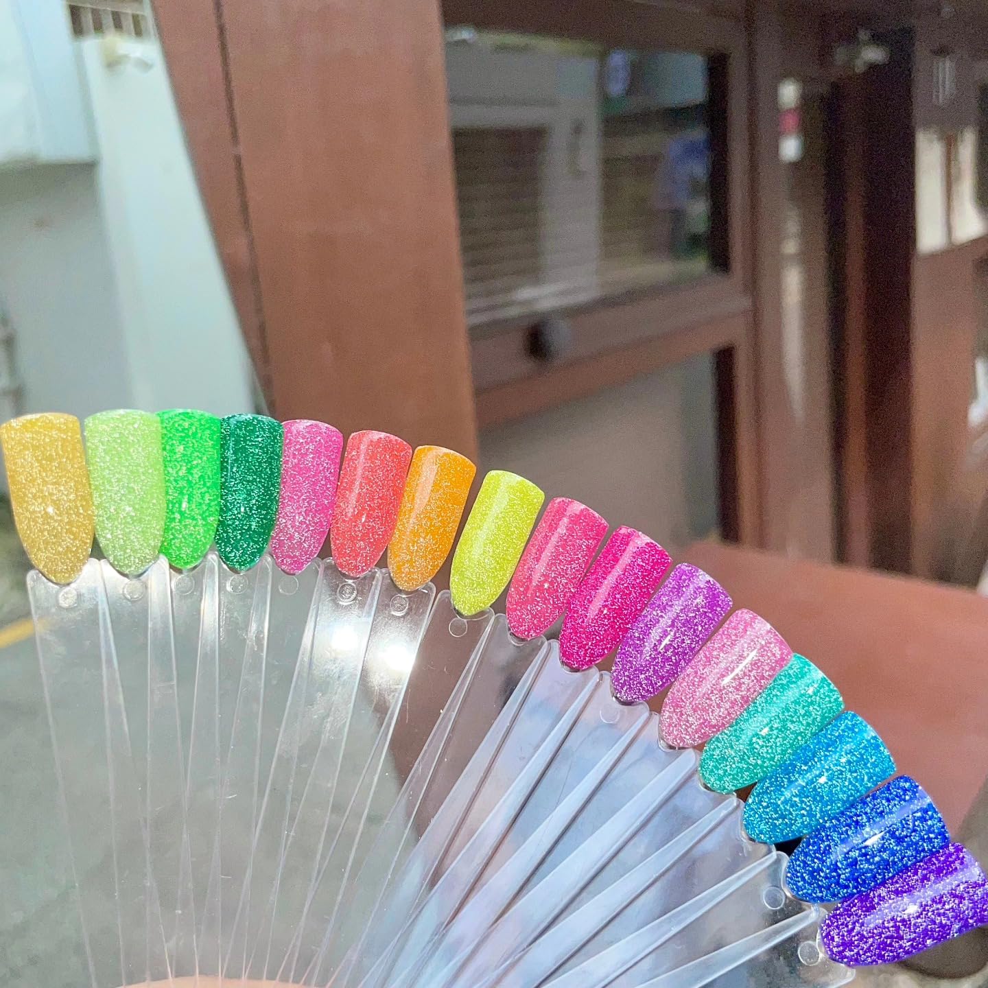 Close up of clear square nail polish display tips