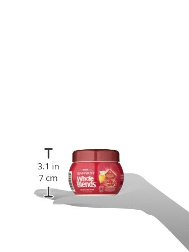 Top down angle of Garnier Whole Blends rinse out hair mask jar