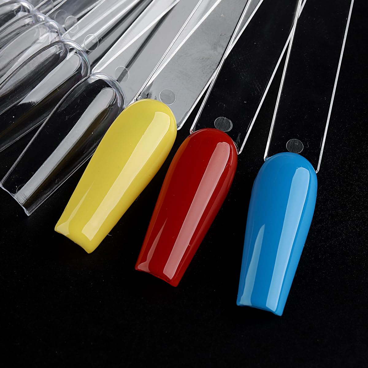 Close up of clear coffin shaped nail art practice tips