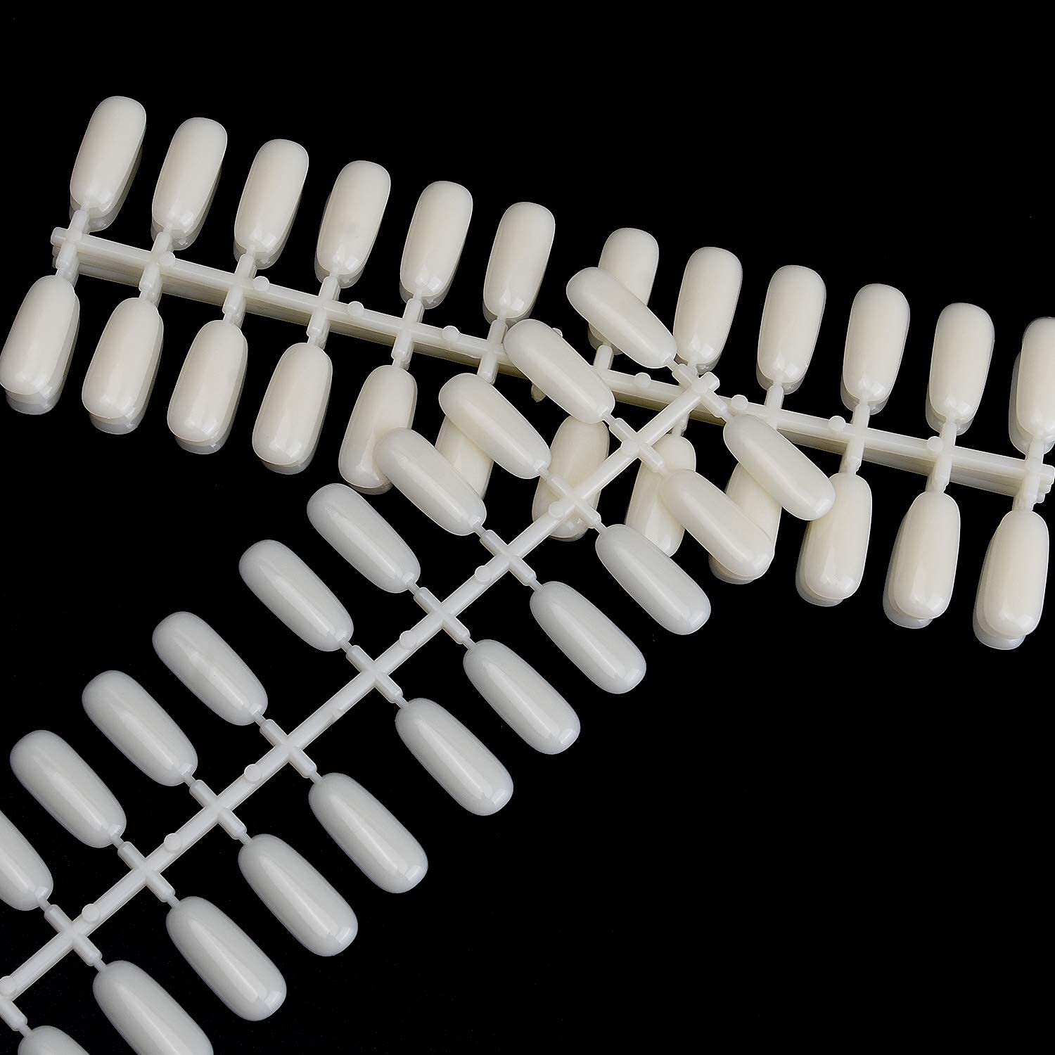 Durable plastic nail tips for tabletop display boards