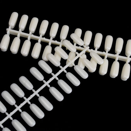 Durable plastic nail tips for tabletop display boards