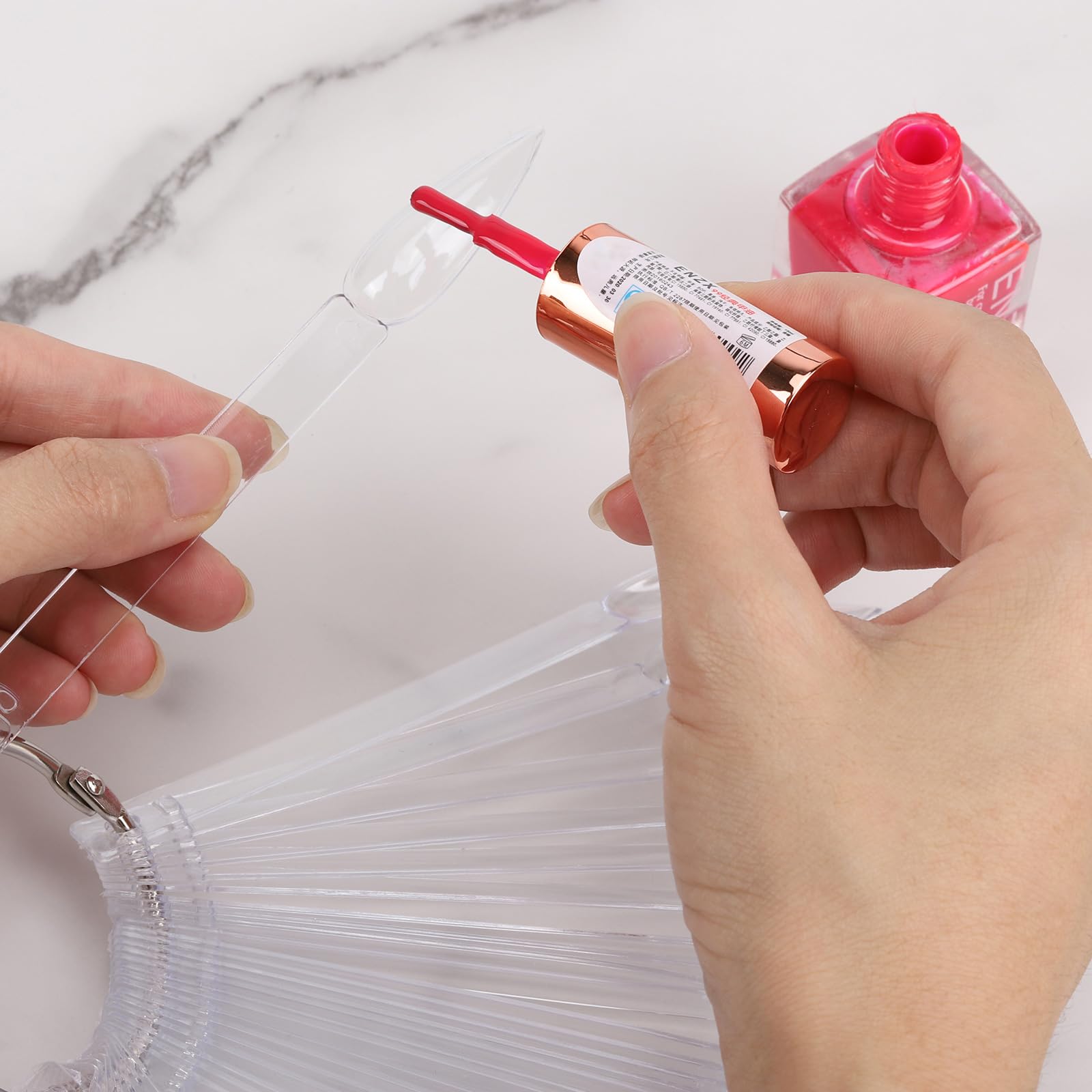 Stiletto shaped clear nail swatch sticks for polish display
