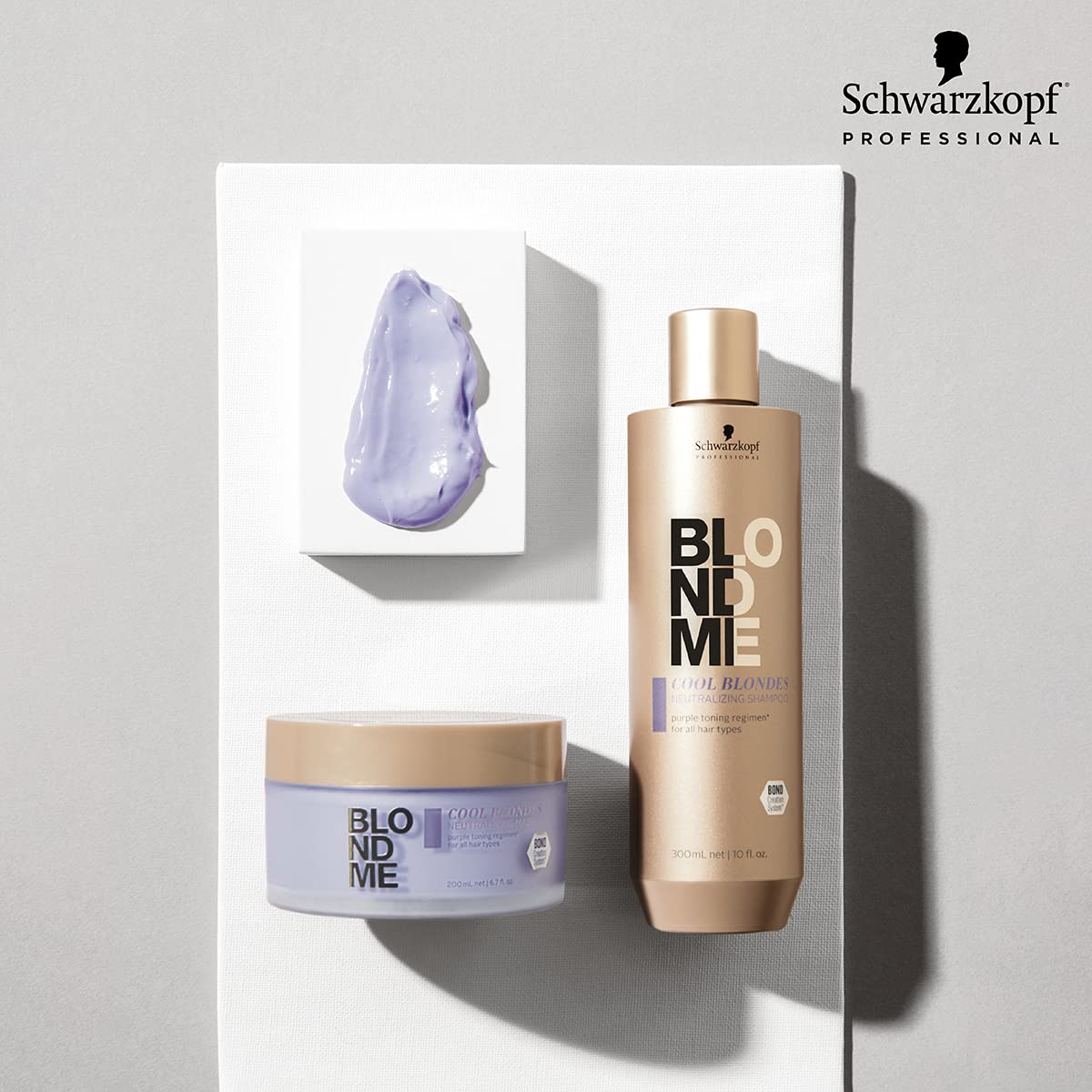 Deep conditioning treatment for blonde hair showing the rich purple cream texture