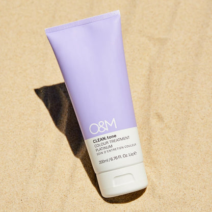 O&M CLEAN.tone professional hair glaze tube showing clean beauty certifications