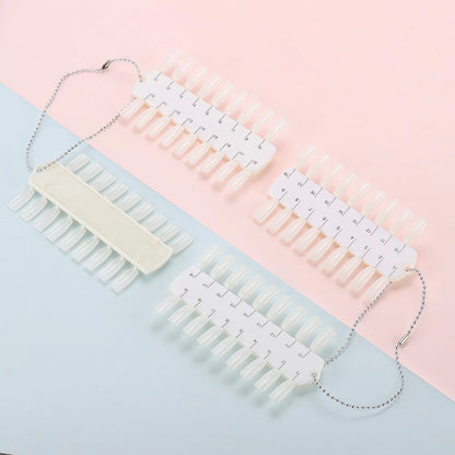 Clear plastic nail polish display tips on metal chain