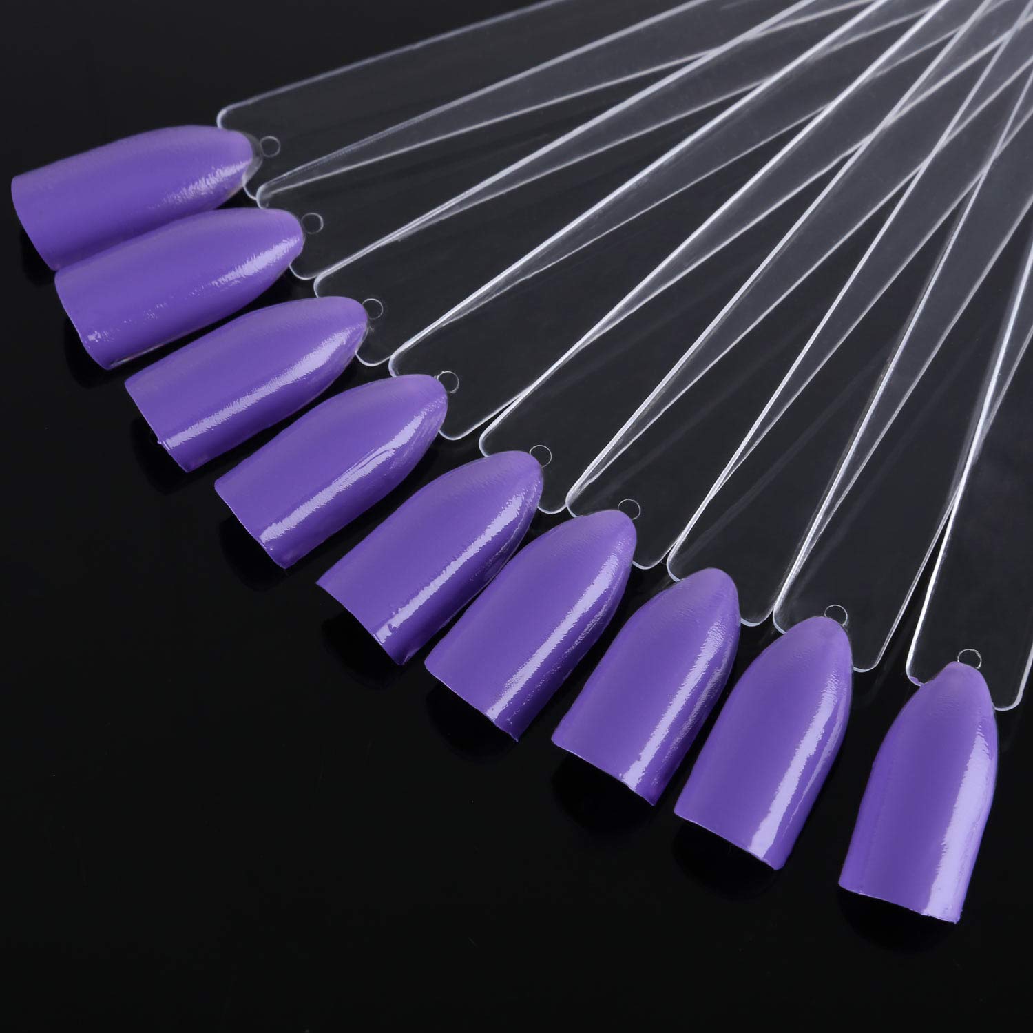 Close up of clear nail polish sample sticks for salon use