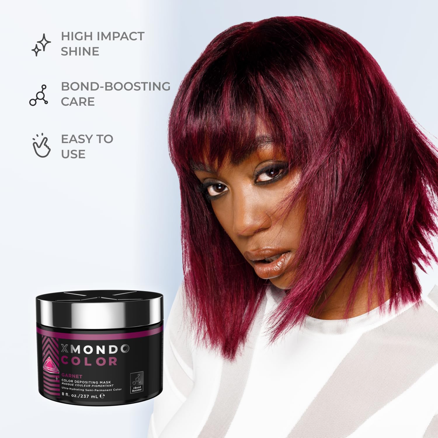Model showing vibrant burgundy hair result after using XMONDO
