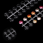 Close up of clear round nail display tips for manicure training