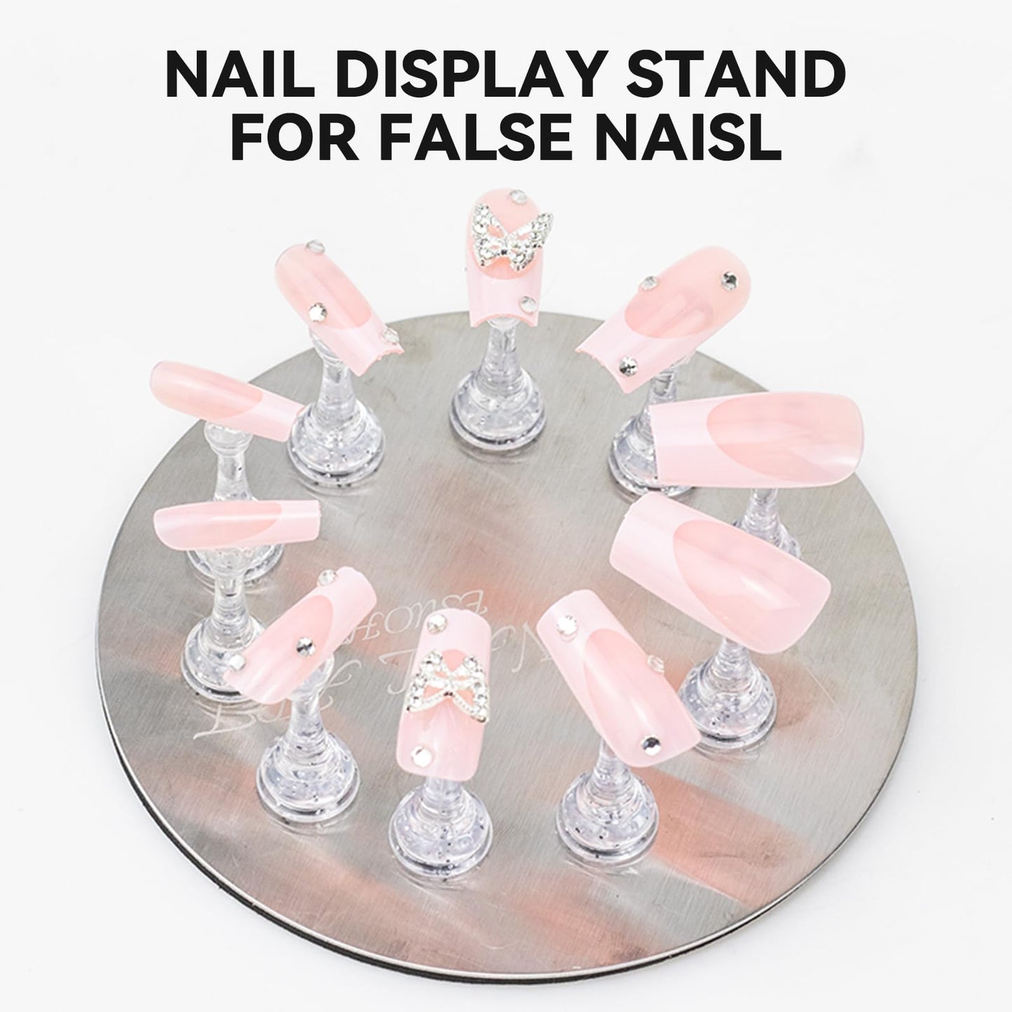 Detailed view of the magnetic base holding multiple press on nail tips.