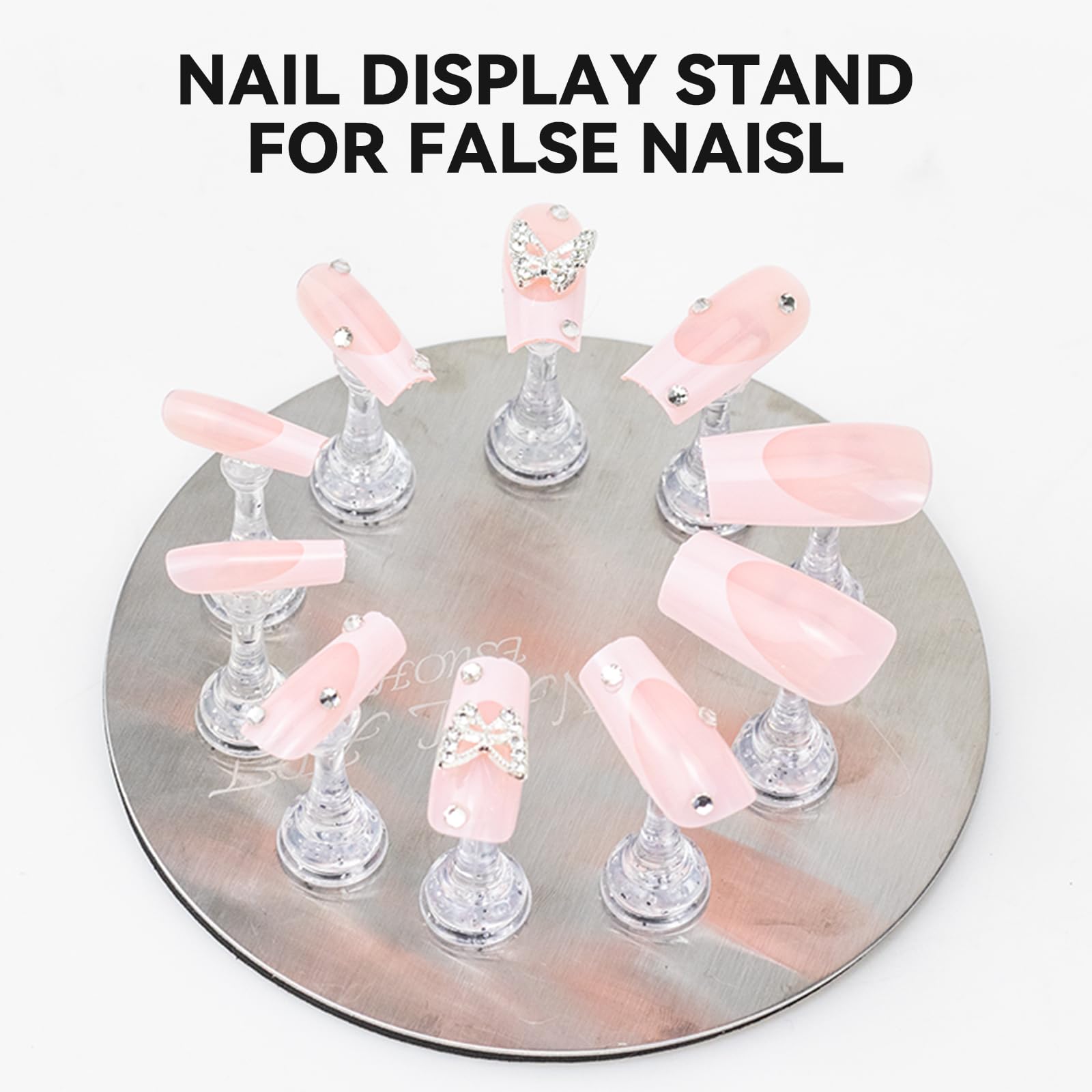 Detailed view of the magnetic base holding multiple press on nail tips.