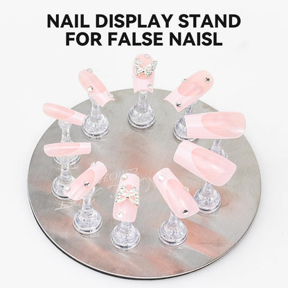 Detailed view of the magnetic base holding multiple press on nail tips.
