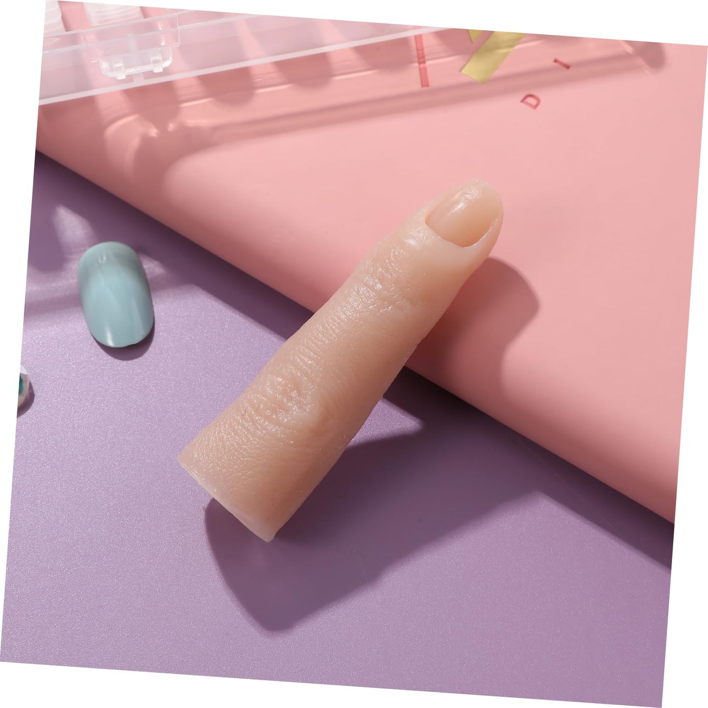 Close up of flexible silicone manicure finger