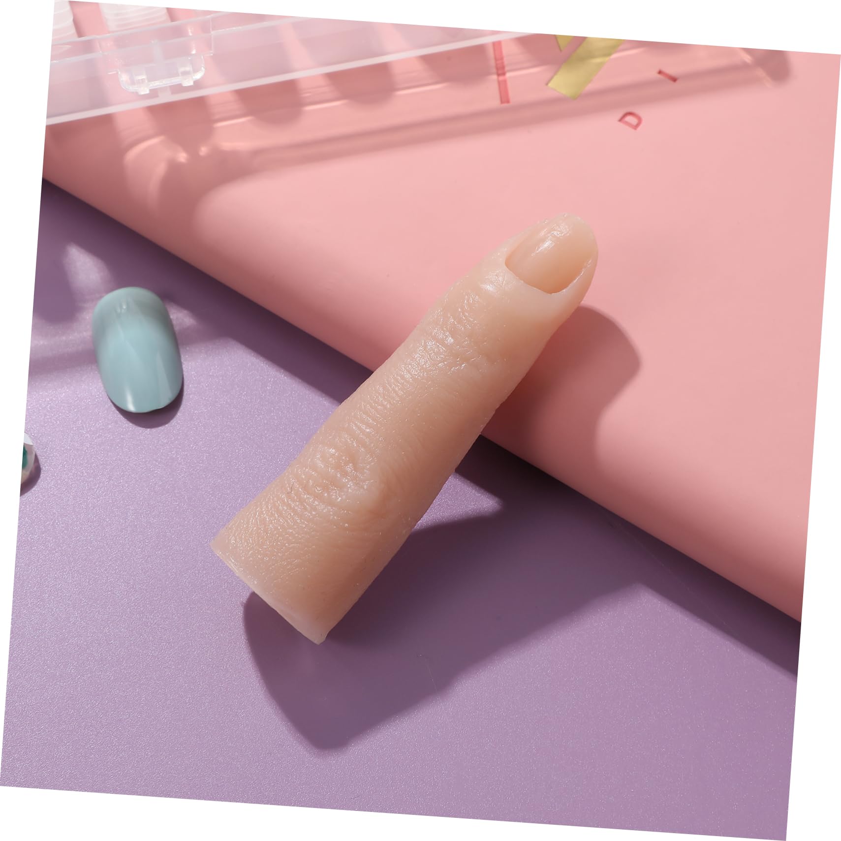 Close up of flexible silicone manicure finger