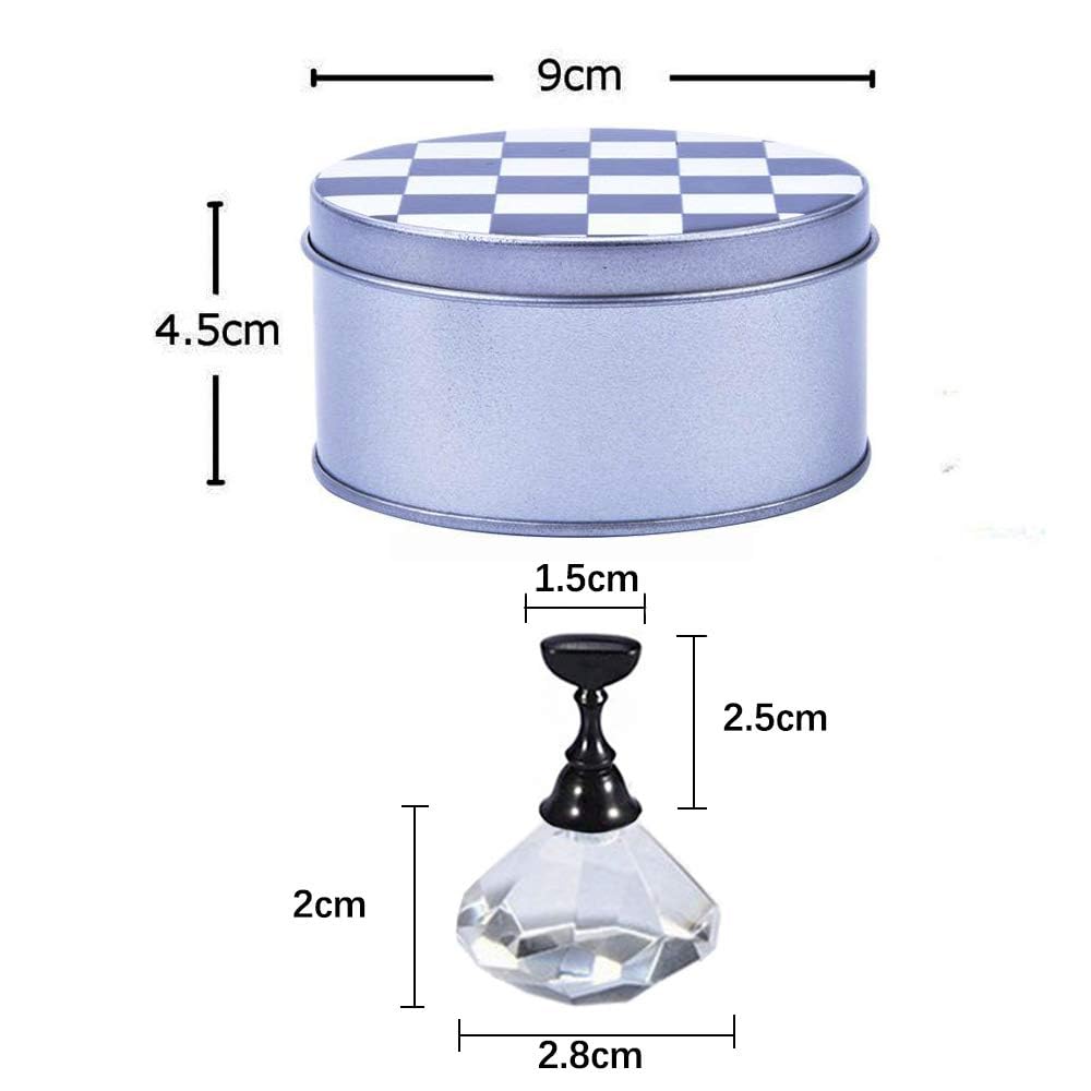 Close up of magnetic nail art tips attached to a transparent chessboard display.